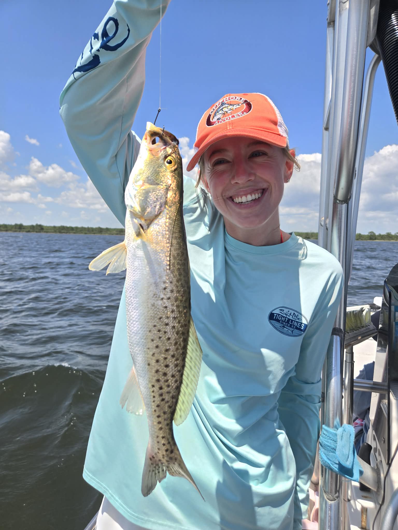 Guest enjoying a successful fishing charter around 30A