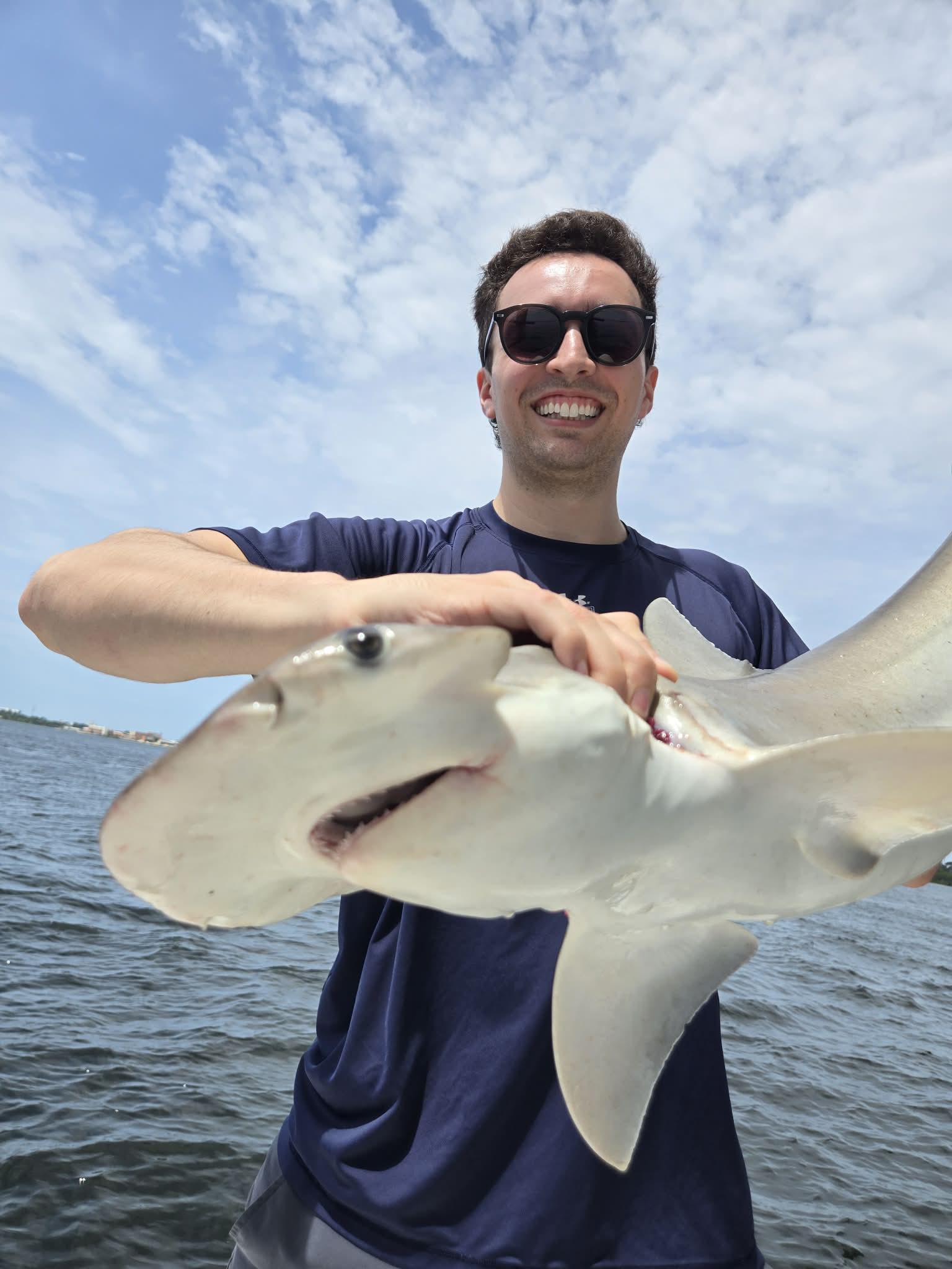 On the water on a private shark fishing trips in 30A